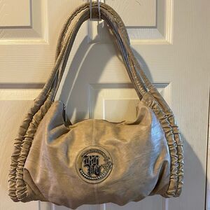 Beverly Hills Polo Club khaki shoulder bag with silver tone accents.